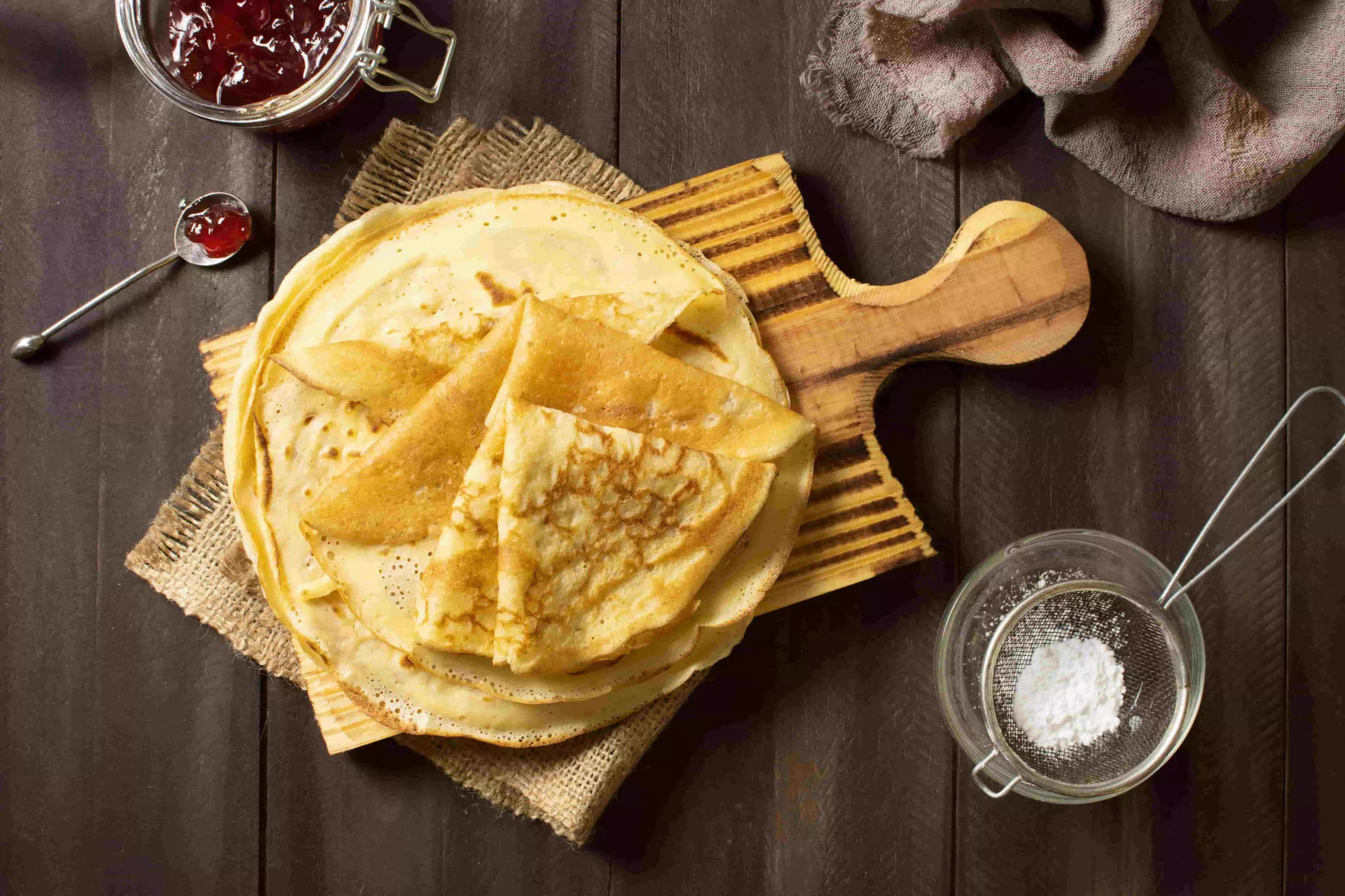 delicious-winter-crepe-dessert-with-jam-and-sugar-min.jpg